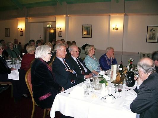 People sitting at tables at the 2008 Weekend School.